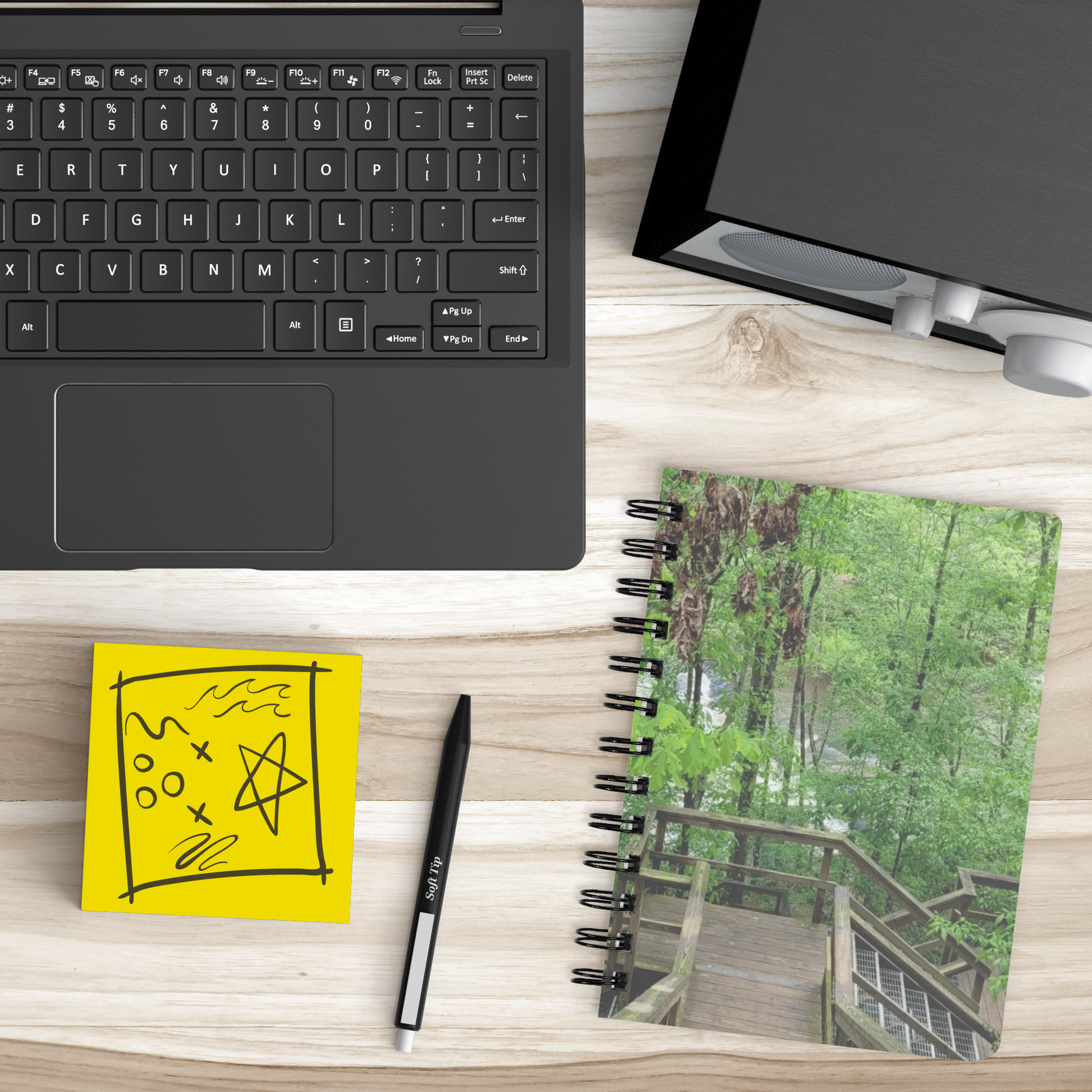 Out_of_the_Woods_Notebook_SB_Lifestyle_Mockup.png